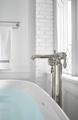Artifacts® floor-mount bath filler trim with hand-shower