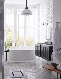Artifacts® floor-mount bath filler trim with hand-shower