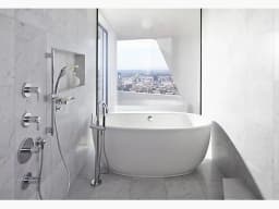 KOHLER Sunstruck® 65-1/2 x 35-1/2 in. Freestanding Bathtub with Center Drain