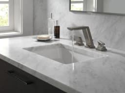 Pivotal® Two Handle Widespread Bathroom Faucet In Black Stainless