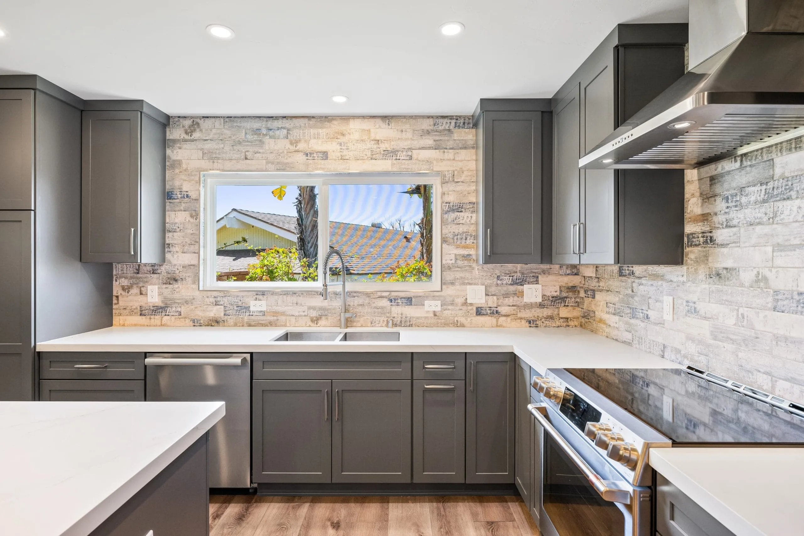 Beautifully remodeled kitchen with modern appliances and elegant design